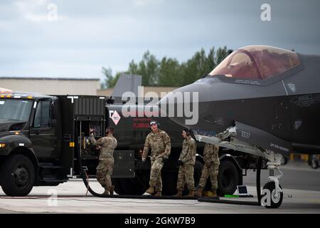 U.s. Airmen Assigned To The 354th Logistics Readiness Squadron Pose For 