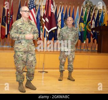 Brig. Gen. Anthony McQueen, Commanding General, U.S. Army Medical Research and Development Command and Fort Detrick, MD. speaks about the accomplishments of Col. (P) Clinton Murray during a Relinquishment of Command Ceremony, July 8, 2021. Murray served as the commander of the Walter Reed Army Institute of Research (WRAIR) during a pivotal period in which WRAIR dealt with the Covid-19 pandemic. Stock Photo