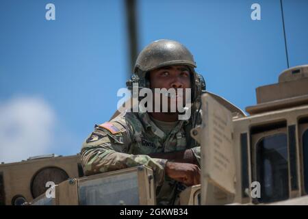 Soldiers from 3rd Armored Brigade Combat Team, 1st Cavalry Division position their Bradley Fighting Vehicle during a defensive attack training exercise at Fort Hood Texas, July 9, 2021. Stock Photo