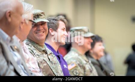 Smiles: 210708- A-UJ420-1006  Third from left, Fort Bliss Garrison Command Sgt. Maj. Gerardo Gonzalez, is all smiles, during the Fort Bliss Garrison Change of Command ceremony between Col. Stuart James, outgoing commander, and Col. James Brady, incoming, July 8 Stock Photo