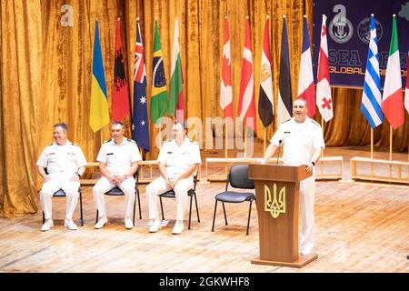 210710-N-BM428-0090 ODESA, Ukraine (July 10, 2021) Oleksiy Neizhpapa, commander of the Ukrainian Navy, makes remarks during the closing ceremony of Exercise Sea Breeze 2021 in Odesa, Ukraine, July 10, 2021. Exercise Sea Breeze is a multinational maritime exercise cohosted by the U.S. Sixth Fleet and the Ukrainian Navy since 1997. Sea Breeze 2021 is designed to enhance interoperability of participating nations and strengthens maritime security and peace in the region. Stock Photo