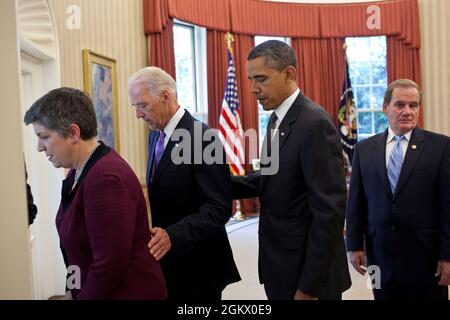 Homeland Security Secretary Janet Napolitano, Vice President Joe Biden, President Barack Obama, and Tom Nee, president of the National Association of Police Organizations, make their way from the Oval Office to a Rose Garden ceremony honoring TOP COPS, May 12, 2011. (Official White House Photo by Pete Souza)  This official White House photograph is being made available only for publication by news organizations and/or for personal use printing by the subject(s) of the photograph. The photograph may not be manipulated in any way and may not be used in commercial or political materials, advertis Stock Photo