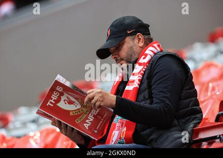 Liverpool, UK. 15th Sep, 2021. A Liverpool reads todays match day program in Liverpool, United Kingdom on 9/15/2021. (Photo by Mark Cosgrove/News Images/Sipa USA) Credit: Sipa USA/Alamy Live News Stock Photo