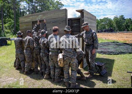 U.S. Marines with Bravo Company, 8th Engineer Support Battalion, 2nd Marine Logistics Group, build a combat operations center during a field exercise on July 14, 2021 at Camp Lejeune, North Carolina. The Marines built an underground COC to hide from a simulated enemy in a contested environment. Stock Photo