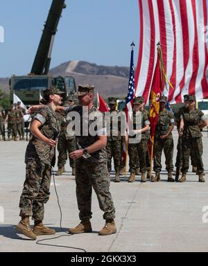 U.S. Marine Lt. Col. Forest J. Rees III, right, the outgoing commanding ...