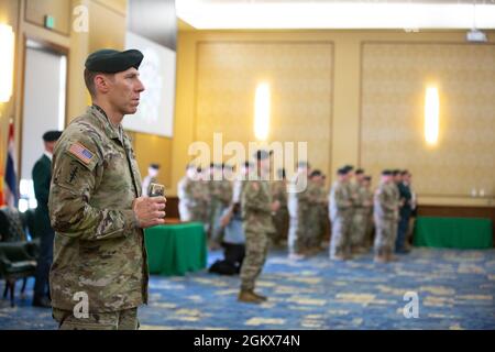 Major General Patrick B. Roberson, commander of the U.S. Army John F. Kennedy Special Warfare Center and School, toasts to the Special Forces Regiment during a graduation ceremony at Fort Bragg, North Carolina, July 15, 2021. The ceremony marked the completion of the Special Forces Qualification Course where Soldiers earned the honor of wearing the green beret, the official headgear of U.S. Army Special Forces. Stock Photo
