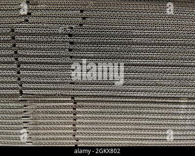corrugated cardboard texture, stacked cardboard boxes, packaging material for parcel packaging, horizontal Stock Photo
