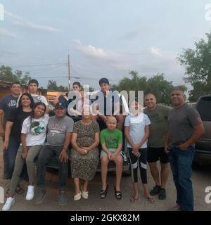 Familia: 200716-A-UJ420-1004  Second from right, Fort Bliss Garrison Command Sgt. Maj. Gerardo Gonzalez, with a few members of his Familia – his children, brother, parents, sister, nieces and nephews, July 2020. Stock Photo