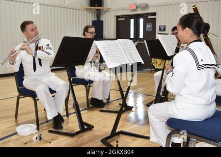 SARATOGA SPRINGS, New York — Rear Adm. Charles Rock, Commander Navy Region Mid-Atlantic, presided as Cmdr. Raymond Gamicchia relieved Cmdr. Phillip Boice as Commanding Officer, Naval Support Activity Saratoga Springs in a ceremony at the installation’s field house July 16. Stock Photo