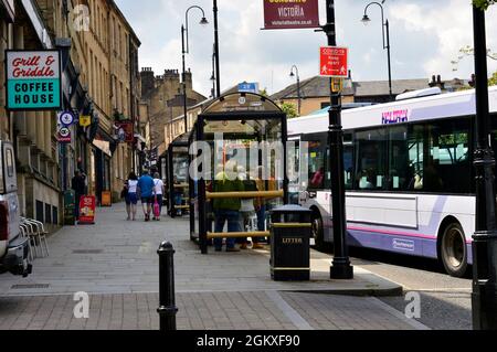 HALIFAX. WEST YORKSHIRE. ENGLAND. 05-29-21. George Street and bus stops on a sunny Saturday afternoon. Stock Photo