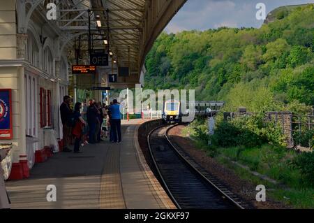 HALIFAX. WEST YORKSHIRE. ENGLAND. 05-29-21. The railway station. Northern Rail DMU 195120 approaches with the 17.17 train to Liverpool Lime Street. Stock Photo