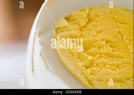 Close Up of a Sliced Hard Boiled Egg Stock Photo