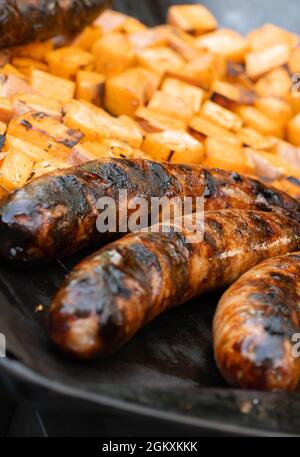 Grilled Brats and Veggies on a Plate Stock Photo