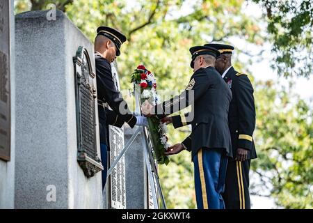 Chaplain (Brig. Gen.) William Green Jr. (back), 26th deputy chief of chaplains, U.S. Army and U.S. Army Sgt. Maj. Ralph Martinez (front), 9th regimental sergeant major, U.S. Army Chaplain Corps place a wreath at Chaplain's Hill in Section 2 of Arlington National Cemetery, Arlington, Virginia, July 22, 2021. The wreath was placed in honor of the 246th Chaplain Corps Anniversary. Stock Photo