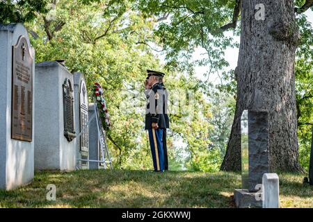 Chaplain (Brig. Gen.) William Green Jr. (back), 26th deputy chief of chaplains, U.S. Army and U.S. Army Sgt. Maj. Ralph Martinez (front), 9th regimental sergeant major, U.S. Army Chaplain Corps place a wreath at Chaplain's Hill in Section 2 of Arlington National Cemetery, Arlington, Virginia, July 22, 2021. The wreath was placed in honor of the 246th Chaplain Corps Anniversary. Stock Photo