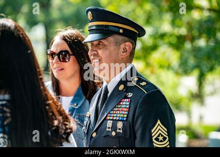 .S. Army Sgt. Maj. Ralph Martinez, 9th regimental sergeant major, U.S. Army Chaplain Corps attends a ceremony in honor of the 246th Chaplain Corps Anniversary at Chaplain's Hill in Section 2 of Arlington National Cemetery, Arlington, Virginia, July 22, 2021. Stock Photo