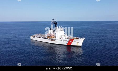 The Crew of Coast Guard Cutter Dependable returned to their homeport in Virginia Beach, Va., after a 29-day patrol in the north-eastern coast of the United States, July 27, 2021. The Virginia Beach-based 210-foot Reliance Class Medium Endurance Cutter contains a permanent crew complement of 75 personnel. Stock Photo