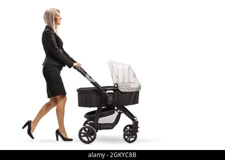 Full length shot of a beautiful young businesswoman pushing a baby stroller isolated on white background Stock Photo