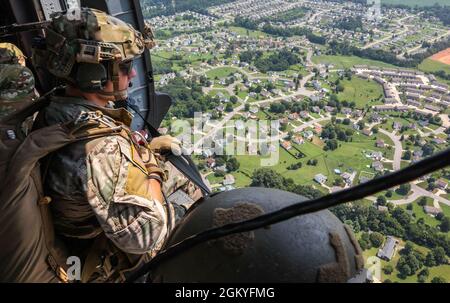 Green berets assigned to the 5th Special Forces Group (Airborne) conduct a series of High Altitude-Low Opening (HALO) airborne operations on Fort Campbell, KY, from July 27, 2021 to July 29, 2021. The 101st Airborne Division provided the aircrafts that were used during these events, to include: the UH-60 Black Hawk and the CH-47 Chinook. Stock Photo
