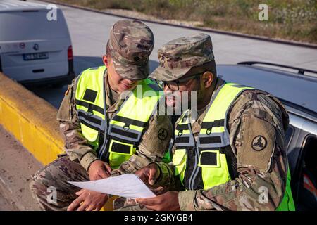 Soldiers assigned to 1st Battalion, 16th Infantry Regiment, 1st Heavy Brigade Combat Team, 1st Infantry Division conducted railhead operations to deliver a fleet of military vehicles to MK Air Base, Romania on July 28, 2021. U.S. Army Sgt. Jamal Slaughter and Spc. Eduardo Rivera, assigned to 261st Movement Control Team, 330th Transportation Battalion, 3rd Sustainment Command (Expeditionary), oversee the safety of the railhead operations.