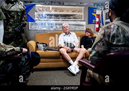 Thomas Coons (left), senior master sergeant, retired, and his wife Sandi, meet with MTIs with the 737th Training Squadron during a visit, Aug. 30, 2021, at Joint Base San Antonio-Lackland, Texas. Coons joined the U.S. Air Force in 1965 and retired in 1989. He decided it was time to donate his uniform to the Airman Heritage Museum but not without putting it on one last time. Stock Photo