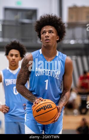 Alpharetta, GA-July 3rd: Mikey Williams in an AAU Game vs E1T1 at Denmark High School in Alpharetta, GA Stock Photo
