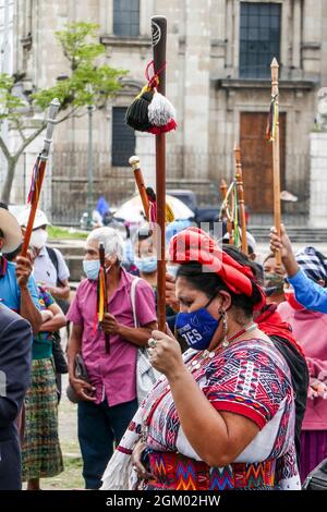 GUATEMALA CITY, GUATEMALA - SEPTEMBER 15, 2021: Hundreds of indigenous leaders of all ethnic groups in Guatemala, take part during a Mayan ceremony today in the 'Plaza Mayor' to protest against celebrating Independence Day, due it commemorates the founding of the racist and exclusive Guatemalan state. Protesters demanded the re-founding of the nation to constitute a multi-ethnic state in which their rights are recognized and the immediate resignation of President Alejandro Giammattei and Attorney General Consuelo Porras. Credit: Eyepix Group/Alamy Live News Stock Photo