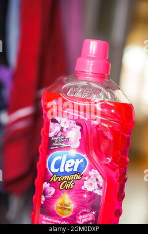 POZNAN, POLAND - Apr 13, 2016: A plastic bottle of Cler floor cleaning liquid on a blurry room background Stock Photo