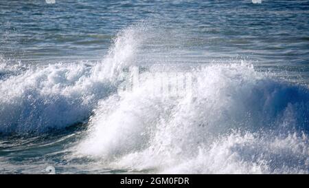 Breaking waves on the Pacific Ocean off the south shore of Kauai Stock Photo
