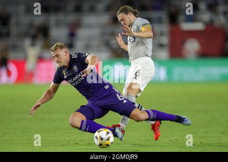 September 15, 2021: Orlando City defender ROBIN JANSSON (6) gets tripped up by CF Montréal midfielder SAMUEL PIETTE (6) during the second half of the Orlando City vs CF Montreal soccer match at Exploria Stadium in Orlando, FL on September 15, 2021. (Credit Image: © Cory Knowlton/ZUMA Press Wire) Stock Photo