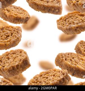 Bread croutons levitate on a white background Stock Photo