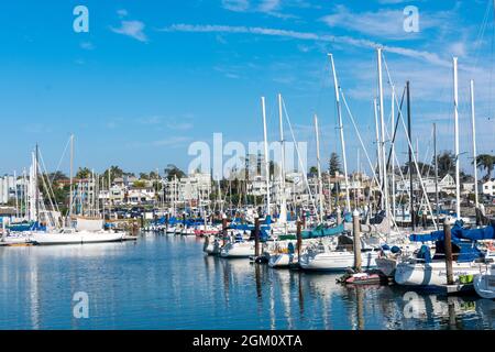 Leisure yachts and fishing boats moored in Santa Cruz Small Craft Harbor marina - Santa Cruz, California, USA - 2021 Stock Photo