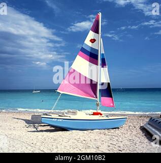 Catamarans on the beach with the Fontainebleau Hilton hotel to the rear, Miami, Florida, USA. Stock Photo