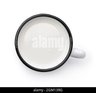 Top view of fresh milk in metal mug isolated on white Stock Photo