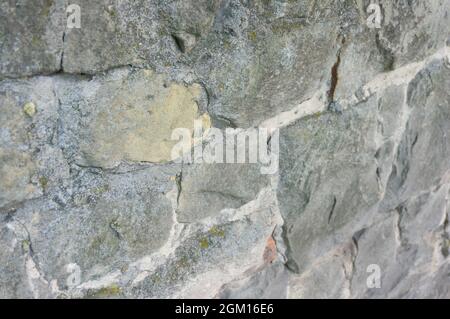 Old stone wall texture with cement joints Stock Photo