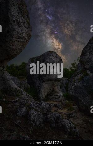 Milky way over rocks in Callejones de las Majadas (Cuenca) Stock Photo