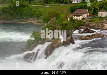 Beautiful view of Rhine falls on an overcast day. The biggest waterfall in Europe at Schaffausen, Switzerrland. Stock Photo