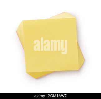 Top view of blank yellow adhesive notes isolated on white Stock Photo