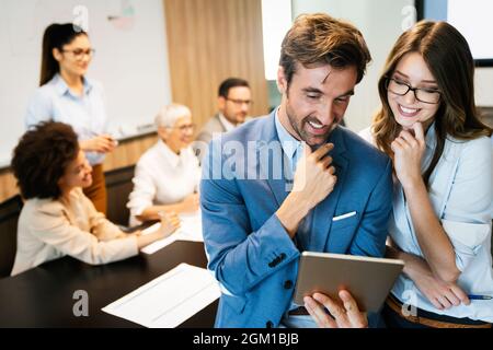 Portrait of successful business team working in office Stock Photo