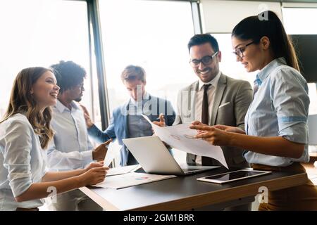 Portrait of successful business team working in office Stock Photo