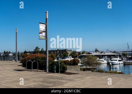 Tacoma, WA USA - circa August 2021: Wide view of Thea Foss Waterway in downtown Tacoma Stock Photo