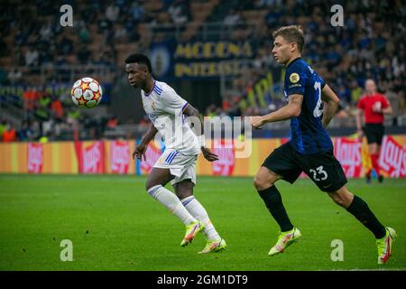 Milan, Italy - september 15 2021 - vinicius junior and nicolò barella in action during Inter- Real Madrid champions league Credit: Christian Santi/Alamy Live News Stock Photo