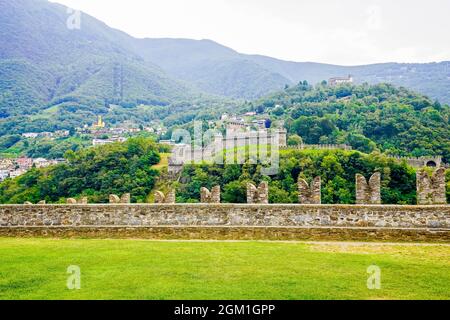 View of Montebello Castle and Sasso Corbaro from Castelgrande in Bellinzona. Bellinzona is a municipality, a historic Swiss town, and the capital of t Stock Photo