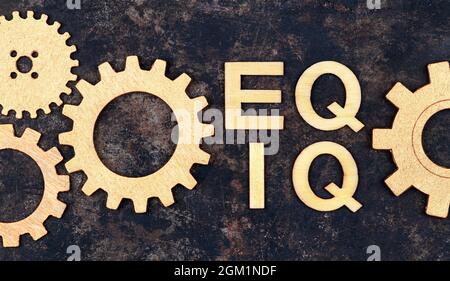 Emotional intelligence, iq eq and empathy concept, wooden text and gears Stock Photo