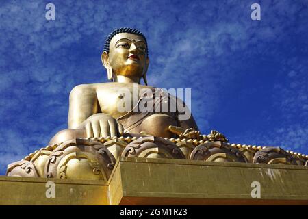 The 51.5-meter-tall Buddha Dordenma statue, sits on a mountain in the Kuensel Phodrang nature park overlooking the entrance to Thimphu Valley, Bhutan. Stock Photo