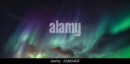 Panorama of Aurora Borealis, Northern Lights with starry in the night sky on Arctic Circle at Norway Stock Photo