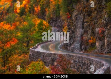 Autumn At Hawks Nest Road  - Car trails along the winding road during autumn in Port Jervis, New York.  This image is available in color as well as bl Stock Photo