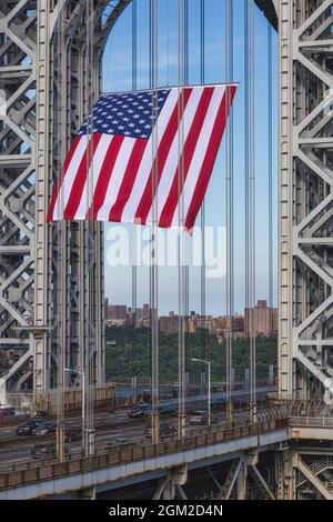 George Washington Bridge USA GWB II  - View of the New Jersey NJ side stanchion with the worlds largest free flying American flag.   The GW is also re Stock Photo