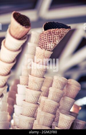 Heap of empty or blank ice cream cones in a shop. Stock Photo