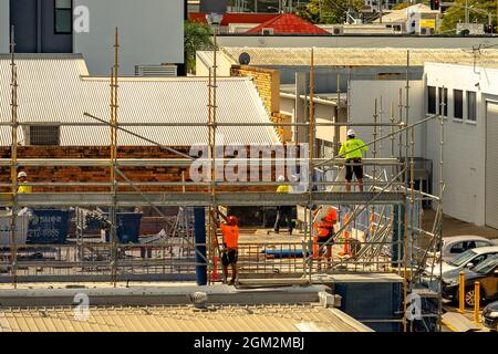 Brisbane, Australia - Construction workers on a building site Stock Photo